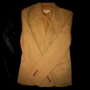 A camel colored blazer.
